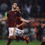 Roma's midfielder from Bosnia-Herzegovina Miralem Pjanic (L) celebrates with teammates after scoring a penalty during the UEFA Champions League football match AS Roma vs Bayer Leverkusen on November 4, 2015 at the Olympic stadium in Rome.    AFP PHOTO / FILIPPO MONTEFORTE        (Photo credit should read FILIPPO MONTEFORTE/AFP/Getty Images)