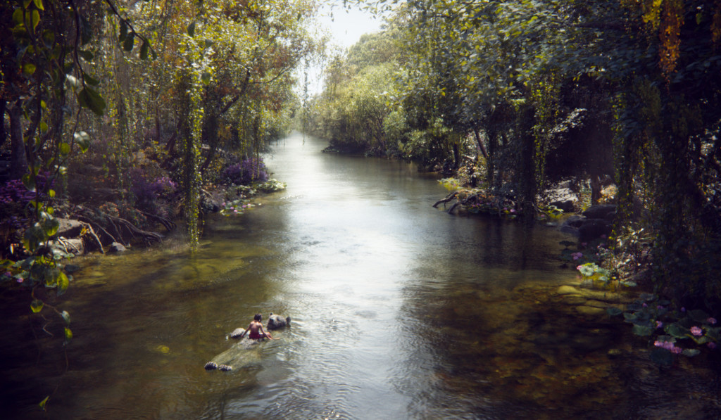 Mowgli (newcomer Neel Sethi) and Baloo (voice of Bill Murray) float down a river in “The Jungle Book,” an all-new live-action epic adventure about Mowgli, a man-cub raised in the jungle by a family of wolves, who embarks on a captivating journey of self-discovery when he’s forced to abandon the only home he’s ever known. In theaters April 15, 2016. ©2015 Disney Enterprises, Inc. All Rights Reserved.